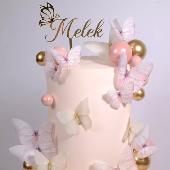 Eleganter personalisierter Cake Topper mit Schmetterlingen und Bubbles in Blush, Roségold und Gold – ideal für Hochzeitstorten oder besondere Anlässe
