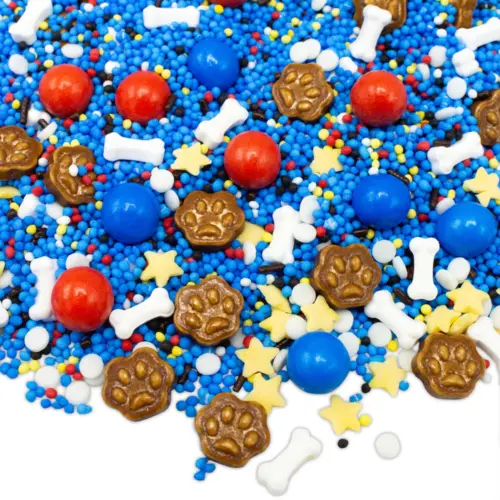 Verschiedene Streusel in Paw Patrol Motiven in den Farben blau, weiß, gelb, braun und rot auf weißem Hintergrund