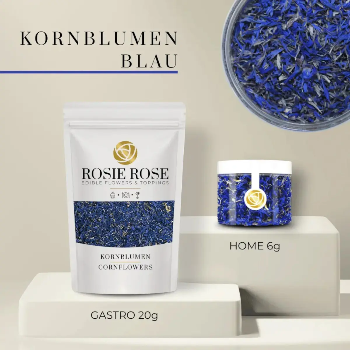 Blaue Kornblumenblüten von Rosie Rose im weißen 20-g-Beutel und in einer transparenten 6-g-Dose mit weißem Deckel.